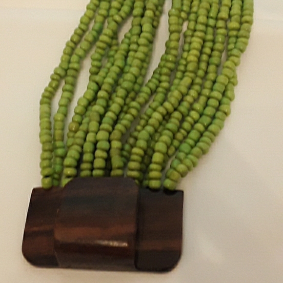 Bracelet with wood clasp and rows of beads - Picture 2 of 3